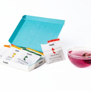 Image of an Oh Christmas Tea Tasting menu box with a selection of festive tea inside it