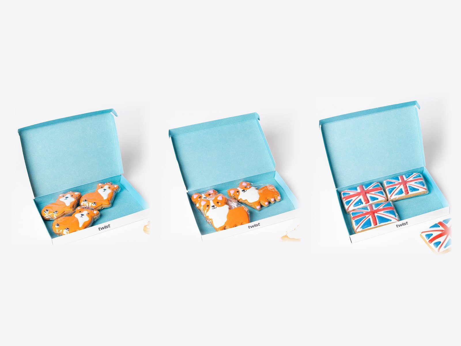 Three Twist gift boxes of hand-iced gingerbread biscuits: King Corgi, Princess Corgi and Union Jack