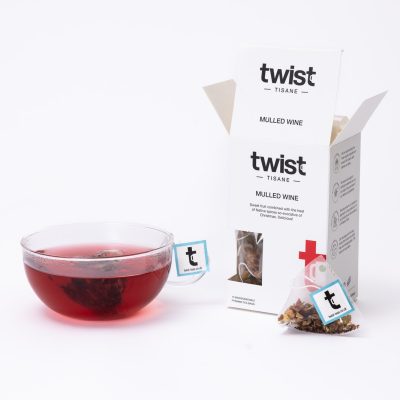 Mulled Wine Christmas tea carton beside a cup of Mulled Wine tea