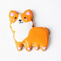 A handmade, hand-iced Princess Corgi gingerbread biscuit