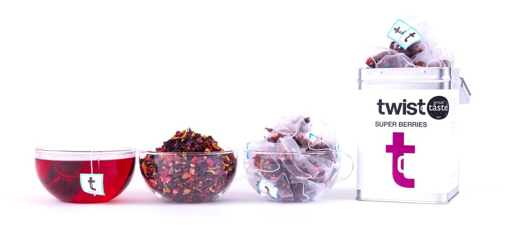Twist Fruit & Herbal: a cup of tea, the loose leaf and the caddy
