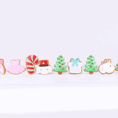 The Nutcracker hand-iced biscuits appearing in a row