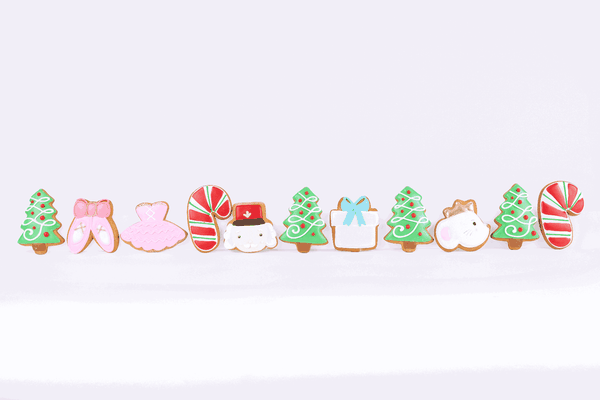 The Nutcracker hand-iced biscuits appearing in a row