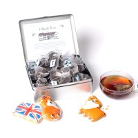 Tea and biscuits caddy with hand-iced gingerbread biscuits